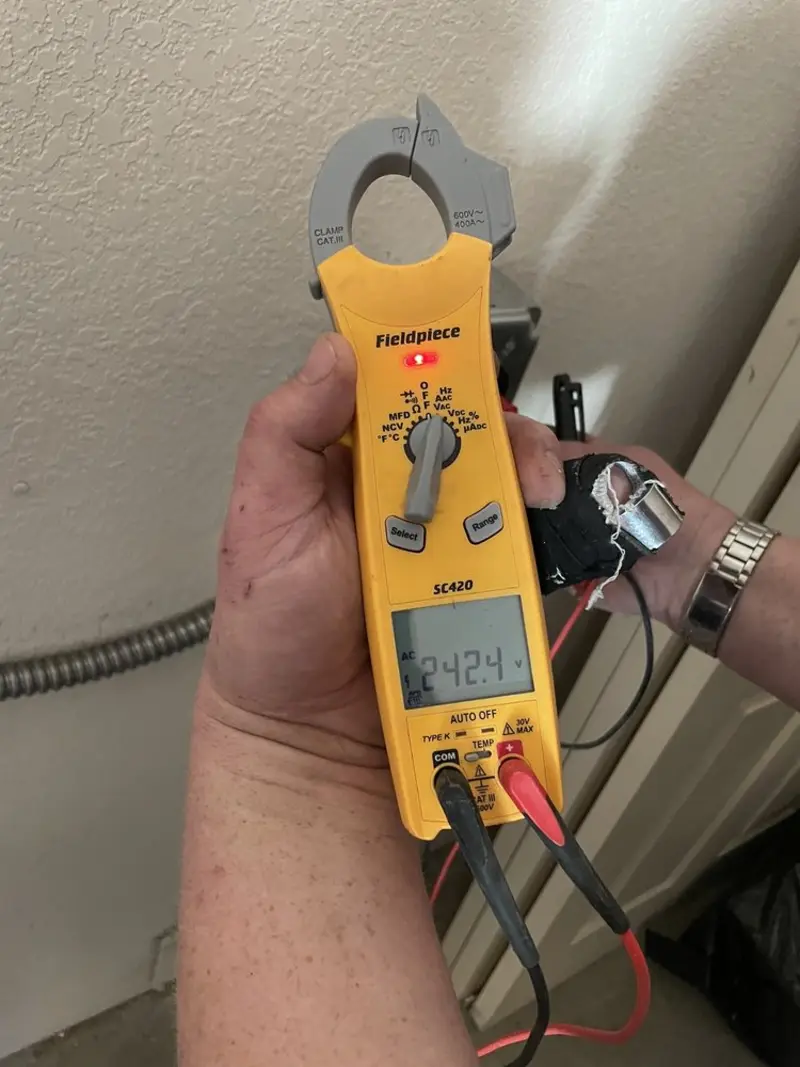 Voltage testing with clamp meter during Circuit Breaker Repair in Urbana